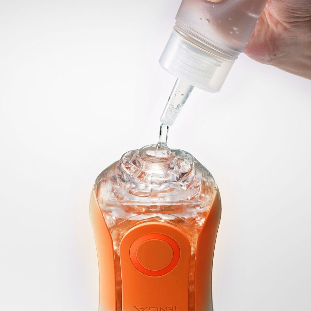 Flip Orb Sunset Orange Reusable Male Masturbator 1s